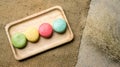 Colorful macaroons on gray background