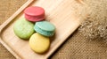 Colorful macaroons on gray background