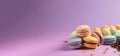 Colorful macaroons on a violet background, banner, Generative AI Royalty Free Stock Photo