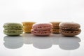 Colorful macaroons on white background