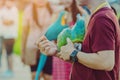 Colorful macaw parrot perching on the hand and wait to fly for excercise Royalty Free Stock Photo