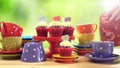 Colorful Mad Hatter style tea party with cupcakes Royalty Free Stock Photo