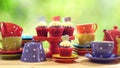 Colorful Mad Hatter style tea party with cupcakes Royalty Free Stock Photo