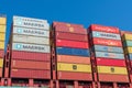 Colorful Maersk, MSC, Hamburg Sud shipping containers stacked at container ship Royalty Free Stock Photo