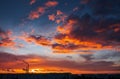 Colorful Magic Sunset. Roofs of city houses during sunrise. Royalty Free Stock Photo