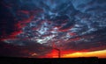 Colorful Magic Sunset. Roofs of city houses during sunrise. Birds flying in the sky. Dark smoke coming from the thermal power Royalty Free Stock Photo