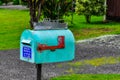 Colorful mailbox in Queen Charlotte Road, New Zealand Royalty Free Stock Photo