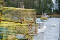 Colorful Maine Lobsterman lobster traps sit on a dock waiting to Royalty Free Stock Photo