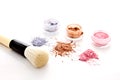 Colorful makeup powder and brush Royalty Free Stock Photo