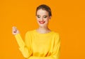 Colorful makeup woman red lips in yellow clothes on color happy summer fashion background manicured nails Royalty Free Stock Photo