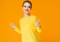 Colorful makeup woman red lips in yellow clothes on color happy summer fashion background manicured nails Royalty Free Stock Photo