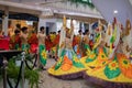 Colorful Male and Female Performers Dance in the Mall