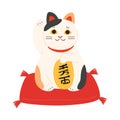 Colorful maneki neko japanese cat statue with raised paw Royalty Free Stock Photo