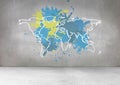 Colorful Map with paint splattered wall background Royalty Free Stock Photo