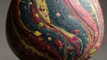 A colorful, marbled, abstract object with vibrant swirling patterns and textures on its surface Royalty Free Stock Photo