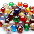 Colorful marbles on a white background,  close-up Royalty Free Stock Photo