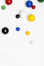 Colorful marbles on white background