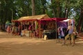 Colorfull clothing shops in an open air market in nature on a music festival