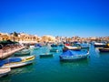 Colorful Marsaxlokk bay with fisher boats at Malta