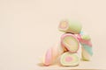 colorful marshmallows on light background, candy pyramid, food card with copy space Royalty Free Stock Photo