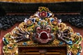 Colorful mask over the entrance to the temple in Nusa Dua, Bali, Indonesia