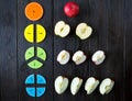 Colorful math fractions and apples as a sample on brown wooden background or table. interesting math for kids. Education