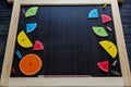 Colorful math fractions and apples as a sample on brown wooden background or table. interesting math for kids. Education, Royalty Free Stock Photo