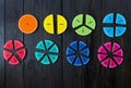 Colorful math fractions on brown wooden background or table. interesting math for kids. Education, back to school concept. Royalty Free Stock Photo