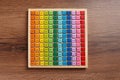 Colorful math game kit with arithmetical tasks on wooden table, top view Royalty Free Stock Photo