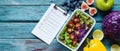 The colorful meal prep container filled with fresh vegetables and fruits. AI generated image Royalty Free Stock Photo