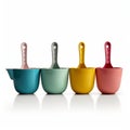 Colorful Measuring Cups On White Background