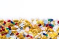 Colorful medication and pills from above on white background Royalty Free Stock Photo