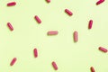 Colorful medicine capsules on a single color background Royalty Free Stock Photo