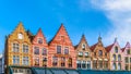 The colorful medieval houses with Step Gables lining the central Markt Market Square in the heart of Bruges, Belgium Royalty Free Stock Photo