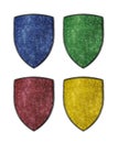 Colorful medieval metal shields isolated on white