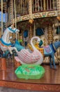 Colorful merry-go-round with animal figures. Empty vintage carousel in park. Retro roundabout. Fairground carousel. Childhood. Royalty Free Stock Photo