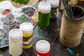 Colorful and messy watercolor buckets still life.