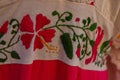 Colorful Mexican embroidery hanging in Cancun Local Fair