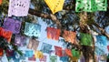 Colorful mexican perforated papel picado banner, festival colourful paper garland. Multi colored hispanic folk carved tissue flags