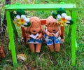 Colorful mini boy and girl statuary Royalty Free Stock Photo