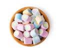 Colorful mini marshmallows in wood bowl isolated on white background Royalty Free Stock Photo