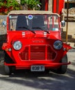 Colorful Mini Moke car in front of famous Eden Rock Hotel on the island of Saint Barthelemy Royalty Free Stock Photo