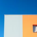 Colorful minimal building with blue sky, clear sky, nature light, Minimal building background.