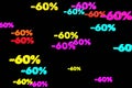 Colorful minus sixty percent symbols fall down isolated on black background 3d render. Concept of discounts, sales
