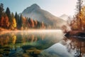 Colorful Misty Morning Autumn Scene Overlooking The Calm Lake, Reflecting The Forest Trees, Mountains, And The Cloudy Sky - Royalty Free Stock Photo