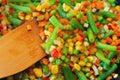 Colorful mix of vegetables is fried in a frying pan close up Royalty Free Stock Photo