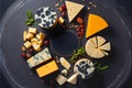 Mixed cheese platter sliced different cheeses Royalty Free Stock Photo