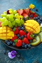 Colorful Mixed Fruit platter with Mango, Strawberry, Blueberry, Kiwi and Green Grape. Healthy food Royalty Free Stock Photo