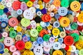 Colorful mixed sewing buttons background. Top view Royalty Free Stock Photo