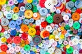 Colorful mixed sewing buttons background. Top view Royalty Free Stock Photo
